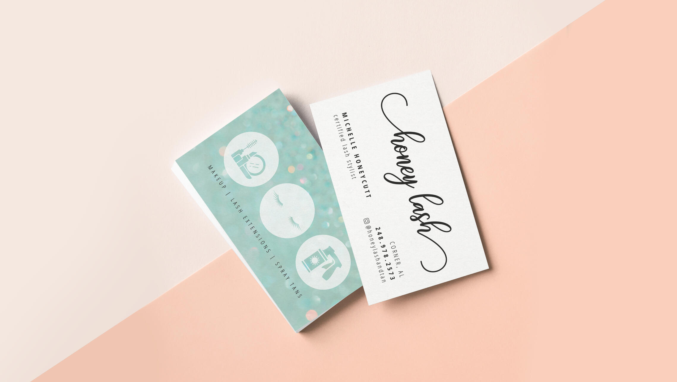 Front and back of a business card design against a two-tone peach background.
